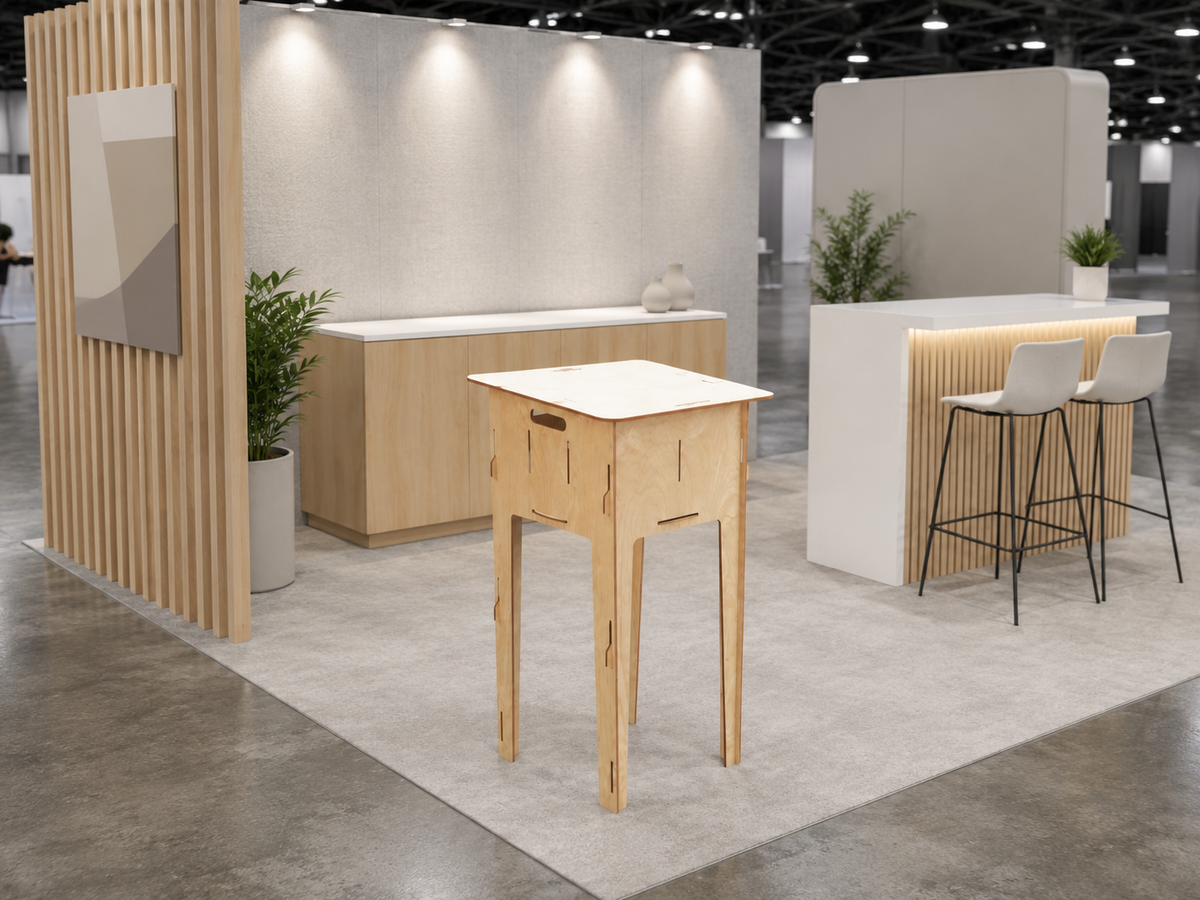 ReFrame podium display in a trade show booth environment